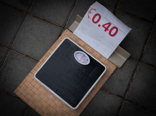 Weight measuring scale on the street. Pay to measure body heaviness.