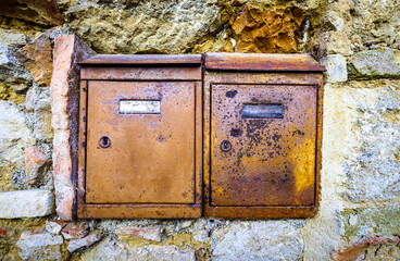 old letterbox at a door