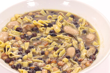 legume minestrone with pasta dish containing legume soup and egg pasta