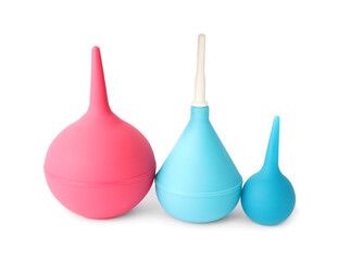 Different enemas on white background. Medical treatment