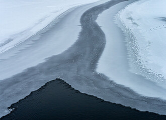 A ice curves across a river on a cold winter day