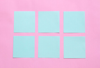 blue pastel sticky note on pink background