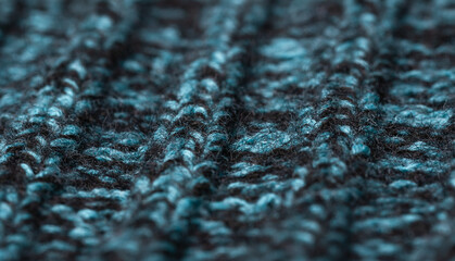 blurred melange background. Knitted textured of woolen threads of different colors and patterns