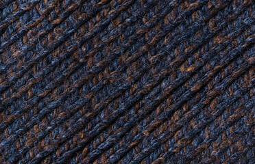 melange background. Knitted textured background of woolen threads of different colors and patterns