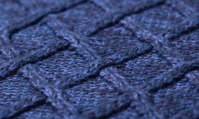 dark blue melange background close up. Image with different types of knitting

