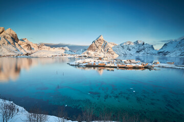 A view of the village of Sakrisoy in the Lofoten Islands in Norway at sunrise