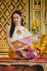 Luxury portrait of a beautiful Thai girl in traditional thai costume, identity culture of Thailand, identity culture of Asia