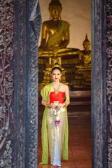 Obraz premium Luxury portrait of a beautiful Thai girl in traditional thai costume, identity culture of Thailand, identity culture of Asia