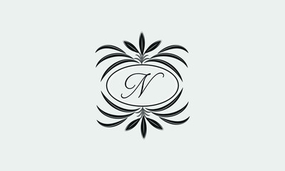 Obraz premium Vector logo design in trendy linear style. Floral monogram with the letter N in the center or space for the text of the letter - an emblem for fashion, beauty and jewelry industry, business