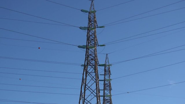 pylons, poles for the distribution of electricity from power plants