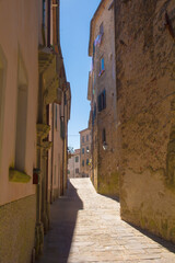 A quiet residential street in the historic medieval village of Scansano, Grosseto Province, Tuscany, Italy
