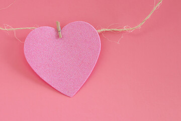 Pink hearts for Valentine's Day on the pink background. Valentine and love concepts.