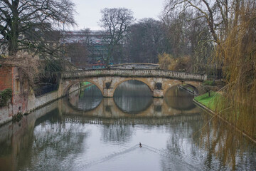 Fototapeta na wymiar Bridge over the water canal, Cambridge, UK, winter 2018