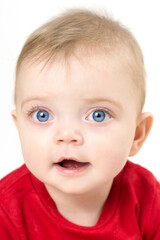 Portrait of a beautiful baby, girl age 8 months from birth. Isolated