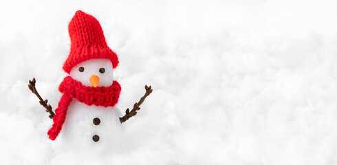 Little snowman in red hat and scarf on snowing background