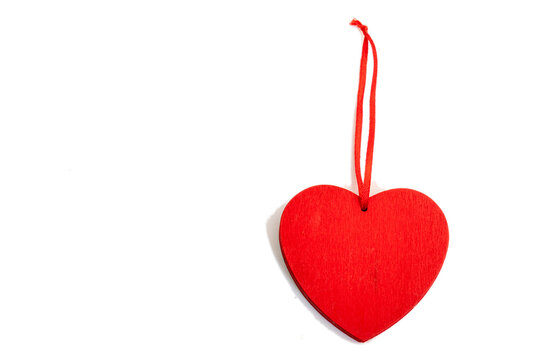 Valentine day wooden red heart on white background. - Powered by Adobe