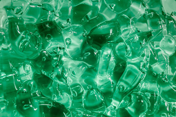 Liquid cream gel, green blue cosmetic texture with bubbles