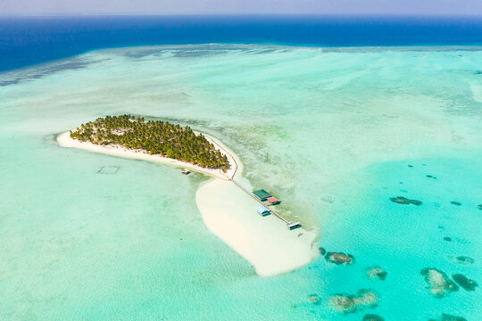 Tropical island surrounded by beautiful lagoons. Onok Island Balabac, Philippines. Rest on a tropical island.