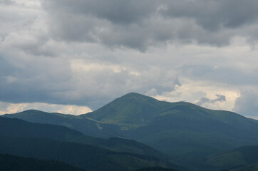 Picturesque Carpathian mountains landscape, panorama view of the Chornohora ridge with one of the highest Ukrainian mountains Petros