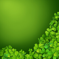 Fresh clover leaves on green background, space for text. St. Patrick's Day celebration
