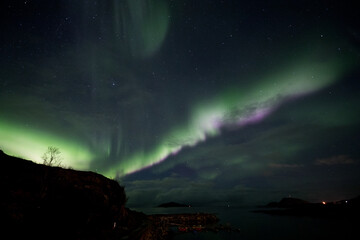 Pink and green aurora in Norway