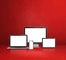 computer, laptop, mobile phone and digital tablet pc. red background