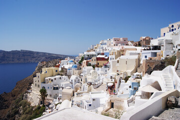 Beautoful view of white town Oia on Santorini island in Greece. Town is situated on volcano calderra. Famous touristic place