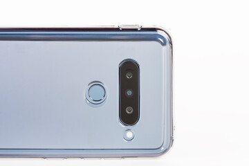 Fototapeta premium Touchscreen triple camera smartphone in silicone cover. Super Wide-Angle, standart, telephoto zoom. Fingerprint sensor.