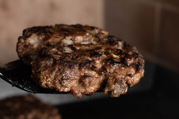steel grilled meat burger with wood flame fries in metallic foil herbs oregano cordoba argentina
