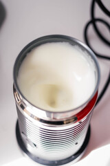 close-up coffee with milk from the machine with foam cordoba argentina