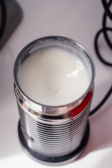 close-up coffee with milk from the machine with foam cordoba argentina