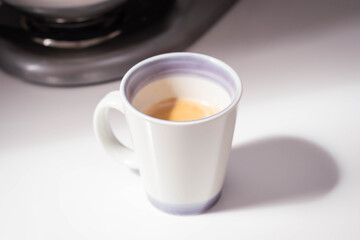 close-up coffee with milk from the machine with foam cordoba argentina