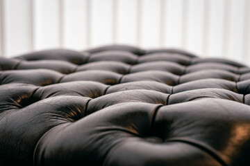 Fototapeta premium brown chester or chesterfield style armchair with buttons on animal skin cordoba argentina