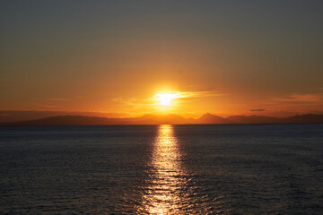 Sunset in Aegean Greece from ferry boat