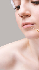 Lips injection at spa salon. Doctor hands. Pretty female patient. Beauty treatment. Healthy skin...