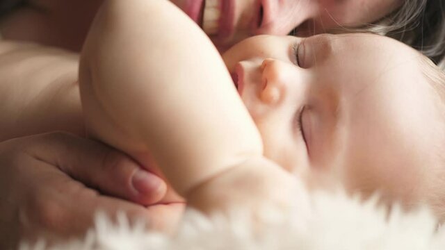 mom woman hugs hugging kissing kisses laughing smiling baby toddler