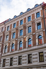 Fototapeta na wymiar Beautiful luxury Real estate flat building with Detailed facade mix