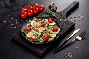 Salad with shrimp, avocado, cucumber, pumpkin seeds and flax seeds with olive oil