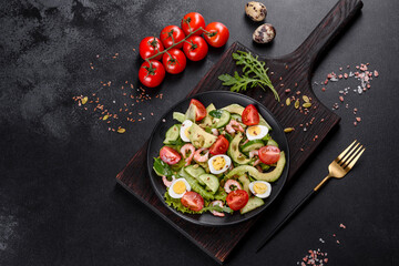 Salad with shrimp, avocado, cucumber, pumpkin seeds and flax seeds with olive oil