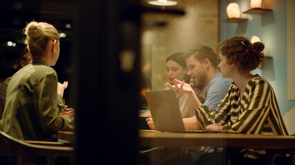 Fototapeta premium Creative team working in boardroom. Successful people giving high five