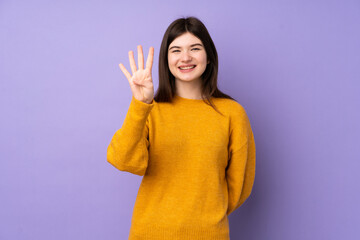 Young Ukrainian teenager girl over isolated purple background happy and counting four with fingers