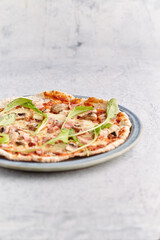 Homemade stone and mold pizzas with fresh vegetables and muzzarella