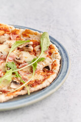 Homemade stone and mold pizzas with fresh vegetables and muzzarella