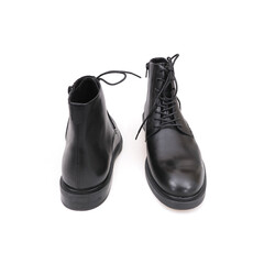 Fashionable black boots for men and women isolated on white background
