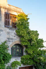 Old buildings and narrow streets in medieval town Villeneuve les Avignon in summer