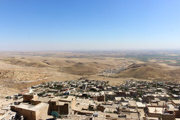 Top view from city of Mardin, Turkey with Mesopotamia Plain in the background. Selective focus.