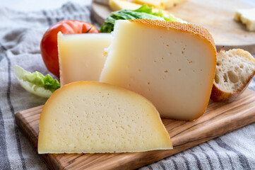 Cheese collection, French fol epi  cheese with many little holes, etorki  and ossau iraty cheese