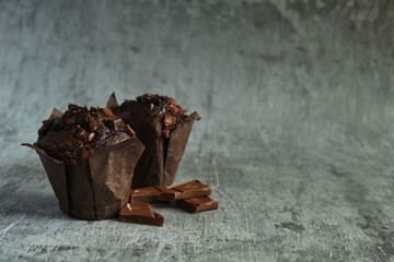 chocolate muffins on a dark background