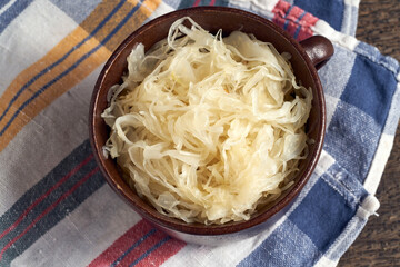 Fermented cabbage in a pot, top view