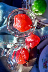 small Mexican candied pink pears in vintage glass dessert dishes